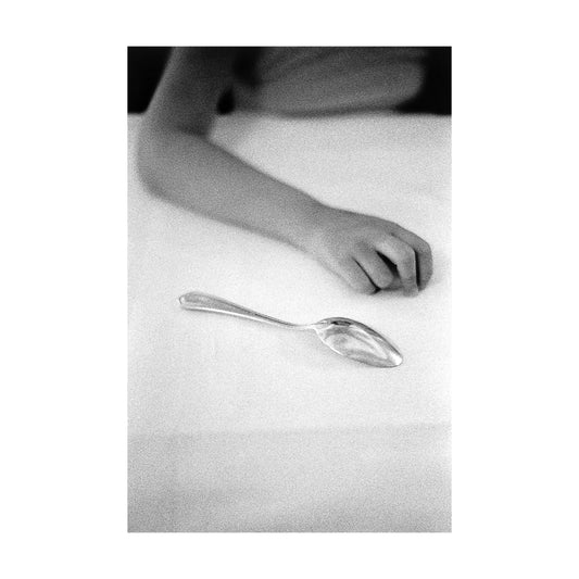 Untitled (hand and spoon)